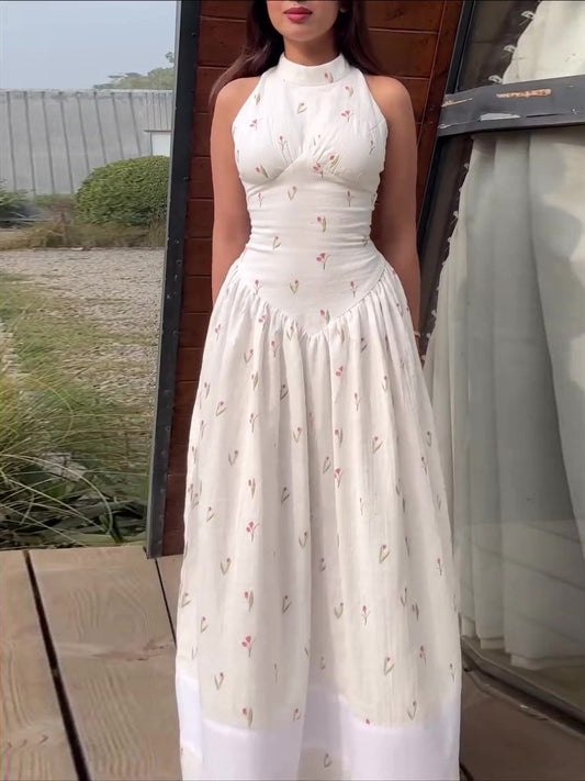 Robe maxi sans manches à col roulé et imprimé floral blanc